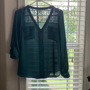 Green blouse with cut out floral pattern in back!